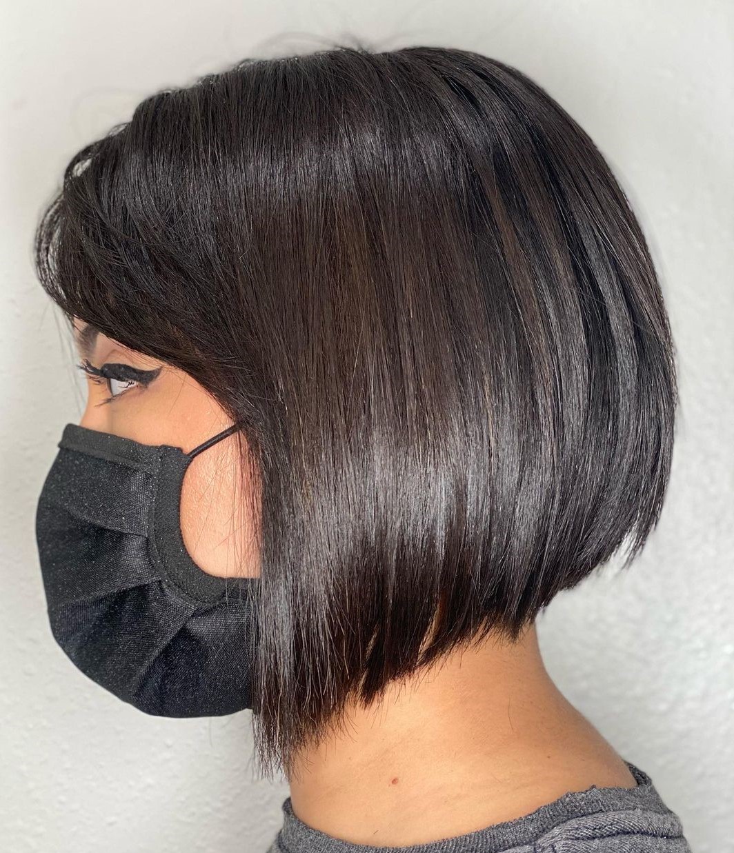 Glossy Brunette Inverted Bob with Side Bangs